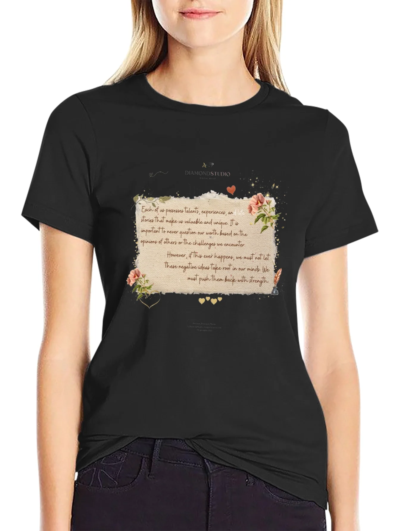 Camiseta Negra con Mensaje Inspirador Floral